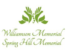 A green hand with the words williamson memorial spring hill memorial written underneath.